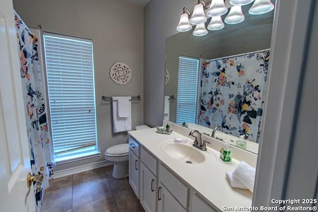 228 Long Crk, New Braunfels, TX 78130 - bathroom featuring toilet, vanity, tile patterned flooring, baseboards, and a shower with curtain