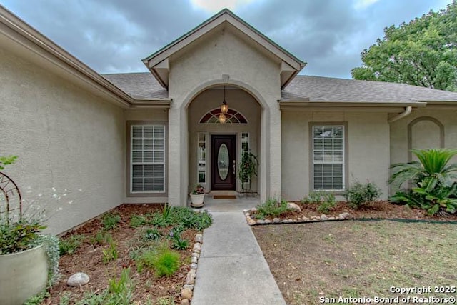 228 Long Crk, New Braunfels, TX 78130 - entrance to property featuring stucco siding and roof with shingles