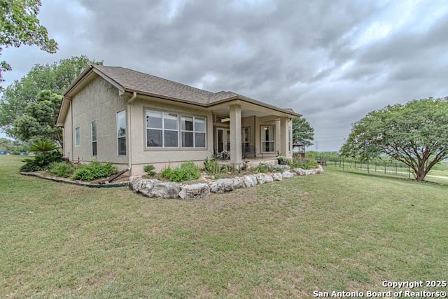 228 Long Crk, New Braunfels, TX 78130 - rear view of property with stucco siding