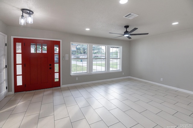 206 Scott, Universal City, TX 78148 - foyer featuring healthy amount of natural light, recessed lighting, ceiling fan, and baseboards