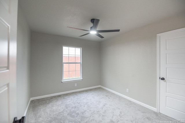 206 Scott, Universal City, TX 78148 - spare room featuring a ceiling fan, carpet, and baseboards