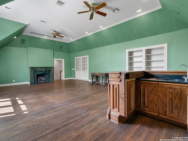 100 Tomahawk Hl, Country Village, TX 78232 - bar area with a sink, a ceiling fan, dark wood finished floors, ornamental molding, and a high end fireplace