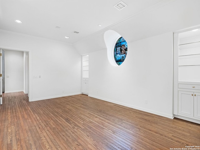 100 Tomahawk Hl, Country Village, TX 78232 - empty room with crown molding, wood finished floors, baseboards, and recessed lighting