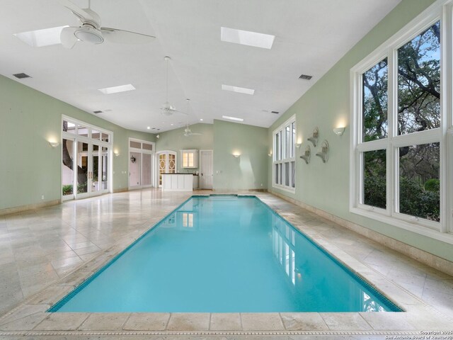 100 Tomahawk Hl, Country Village, TX 78232 - indoor pool with a ceiling fan and a skylight