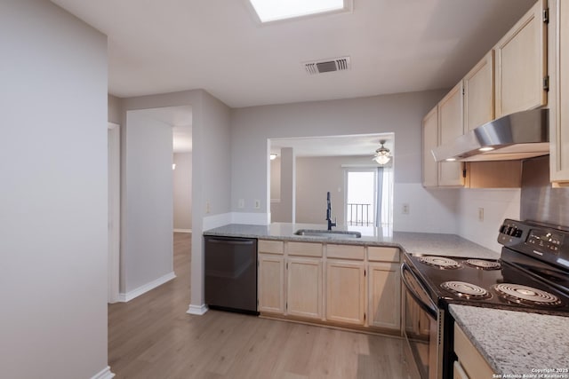 8314 Morning Grv, Converse, TX 78109 - kitchen with black dishwasher, range with electric stovetop, under cabinet range hood, a sink, and light wood finished floors