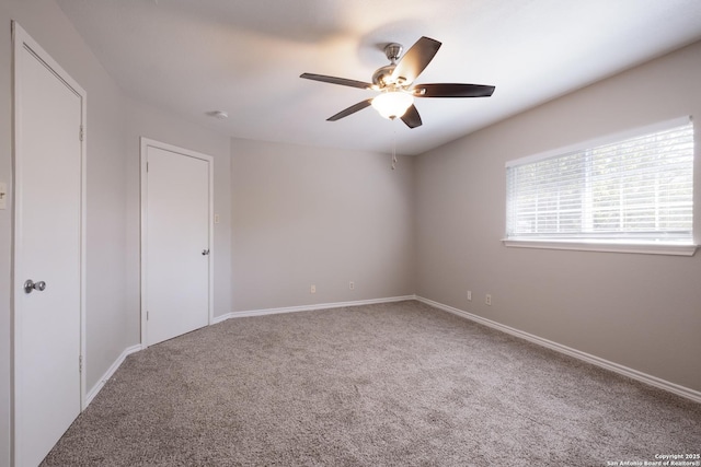 8314 Morning Grv, Converse, TX 78109 - empty room featuring carpet floors, ceiling fan, and baseboards