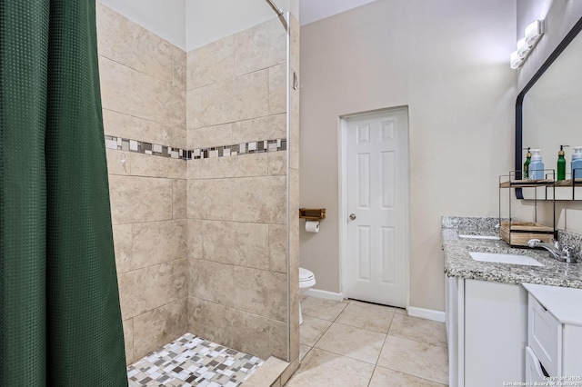 8010 Indian Bnd, San Antonio, TX 78250 - full bath featuring tile patterned flooring, double vanity, a tile shower, and toilet