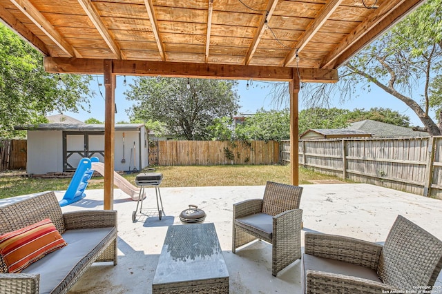 8010 Indian Bnd, San Antonio, TX 78250 - view of patio featuring an outbuilding