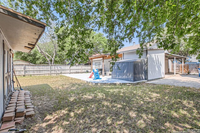 8010 Indian Bnd, San Antonio, TX 78250 - view of yard featuring a patio