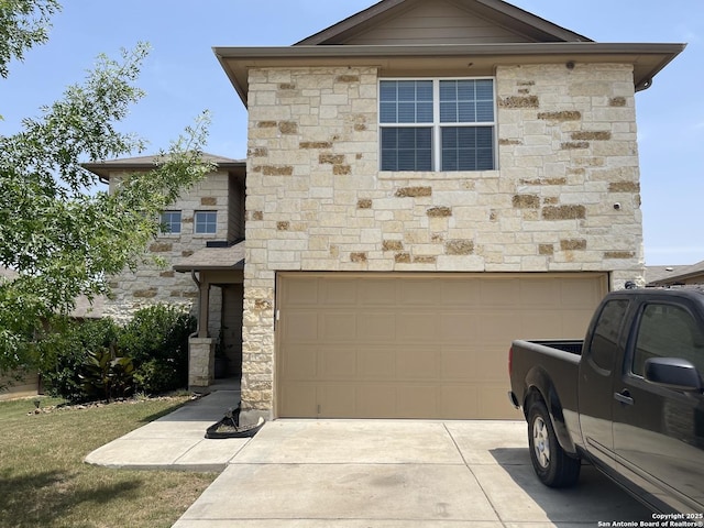 12242 Bening Vly, Schertz, TX 78154 - view of front of house featuring stone siding, a garage, and concrete driveway