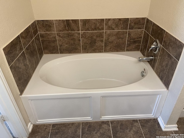 12242 Bening Vly, Schertz, TX 78154 - bathroom with a textured wall and a bath