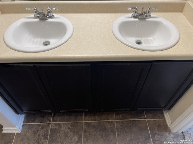 12242 Bening Vly, Schertz, TX 78154 - bathroom featuring double vanity and tile patterned floors