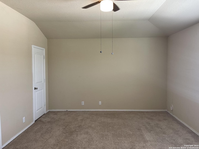 12242 Bening Vly, Schertz, TX 78154 - carpeted spare room with lofted ceiling, a ceiling fan, and baseboards