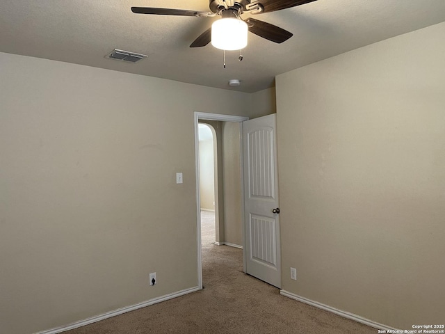 12242 Bening Vly, Schertz, TX 78154 - unfurnished room featuring light colored carpet, a ceiling fan, and baseboards