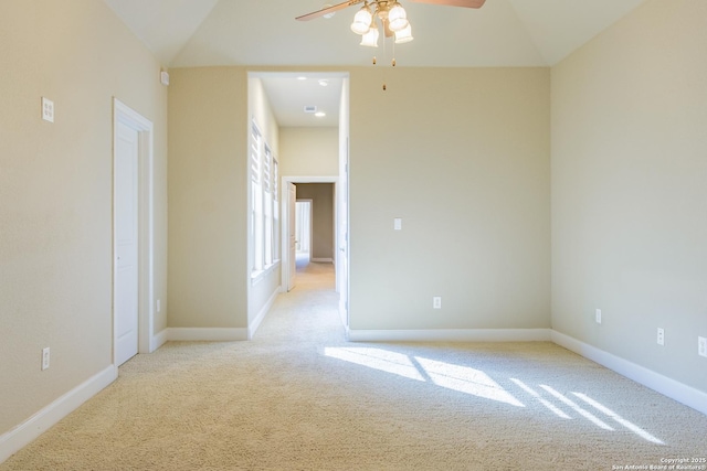 4171 Texas Elm, San Antonio, TX 78230 - empty room with a ceiling fan, light carpet, vaulted ceiling, and baseboards