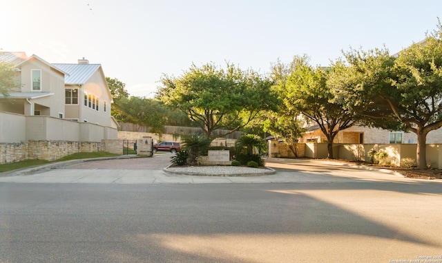 4171 Texas Elm, San Antonio, TX 78230 - view of front of house featuring a chimney, a standing seam roof, metal roof, and a gate