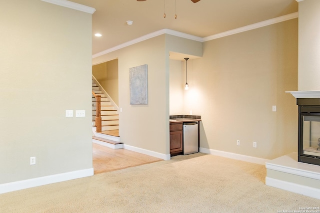 4171 Texas Elm, San Antonio, TX 78230 - unfurnished living room featuring ornamental molding, a ceiling fan, stairs, baseboards, and recessed lighting