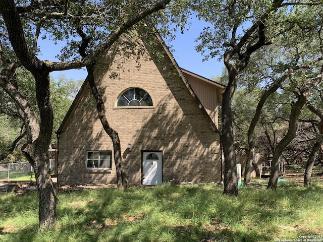 1076 Eastview, Canyon Lake, TX 78133 - view of front of property with brick siding
