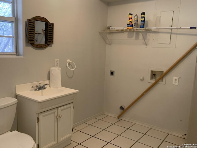 1076 Eastview, Canyon Lake, TX 78133 - laundry area featuring electric dryer hookup, gas dryer hookup, hookup for a washing machine, and baseboards