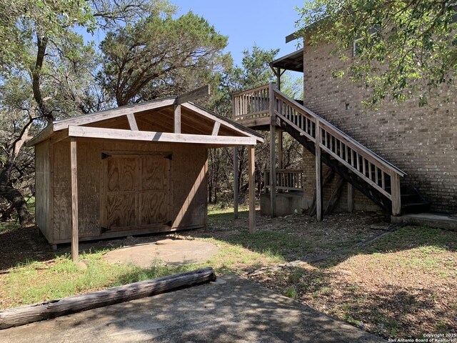 1076 Eastview, Canyon Lake, TX 78133 - view of shed featuring stairway