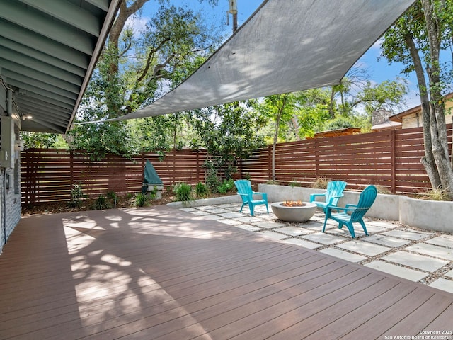 602 Northridge, San Antonio, TX 78209 - wooden deck featuring a fire pit and a fenced backyard