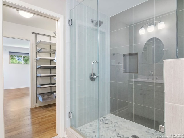 602 Northridge, San Antonio, TX 78209 - bathroom with wood finished floors and a stall shower