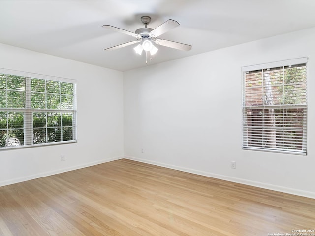 602 Northridge, San Antonio, TX 78209 - empty room featuring healthy amount of natural light, light wood-style floors, and ceiling fan
