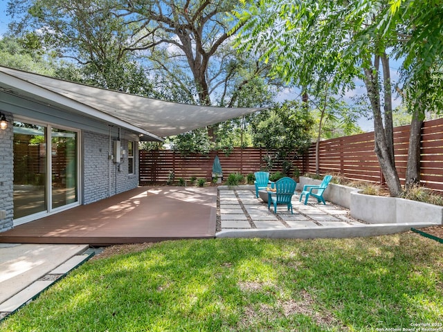 602 Northridge, San Antonio, TX 78209 - view of yard featuring a wooden deck and a patio area
