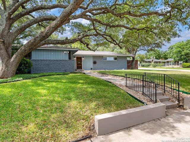 602 Northridge, San Antonio, TX 78209 - view of front of house with a front lawn and brick siding