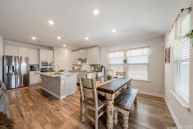 948 Black Horse Way, San Antonio, TX 78260 - dining area featuring healthy amount of natural light, light wood-style floors, recessed lighting, and baseboards