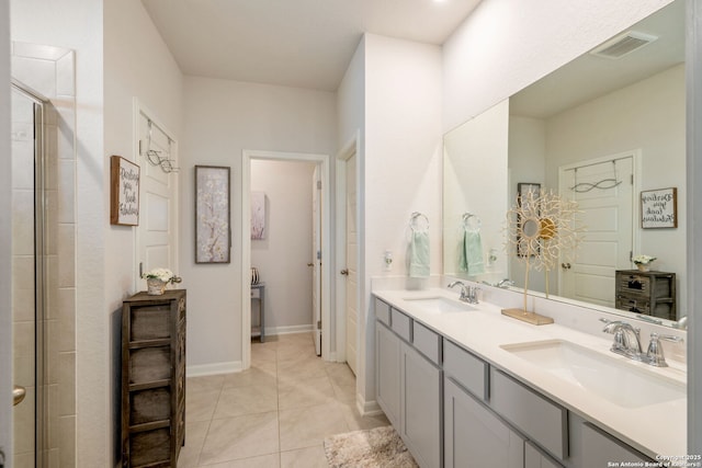 948 Black Horse Way, San Antonio, TX 78260 - bathroom featuring double vanity, tiled shower, tile patterned floors, and baseboards