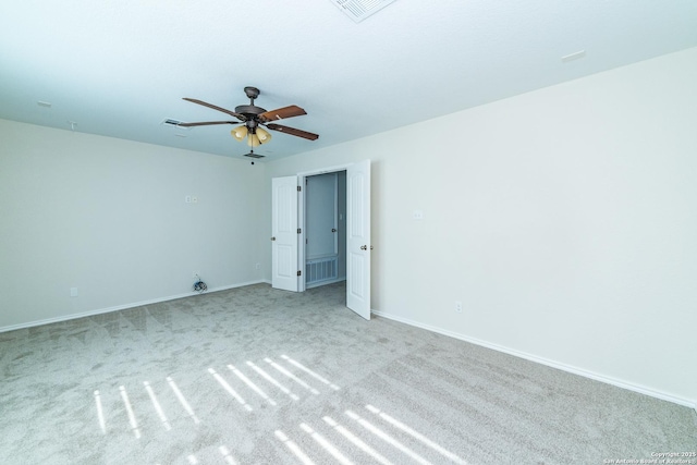 7735 Brisbane Bnd, Converse, TX 78109 - carpeted spare room with baseboards and ceiling fan