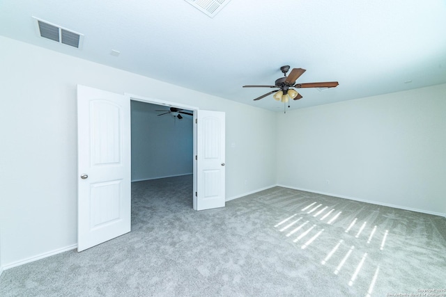 7735 Brisbane Bnd, Converse, TX 78109 - unfurnished bedroom with carpet floors, a spacious closet, and ceiling fan