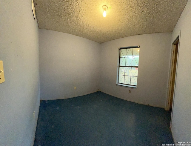 512 Brown Ln, Floresville, TX 78114 - carpeted spare room with a textured ceiling