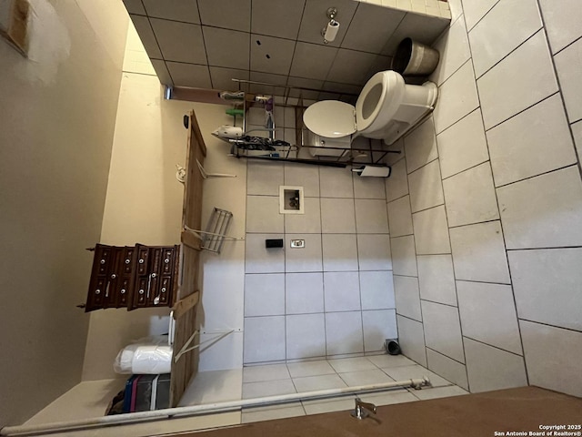 512 Brown Ln, Floresville, TX 78114 - bathroom featuring tile patterned floors