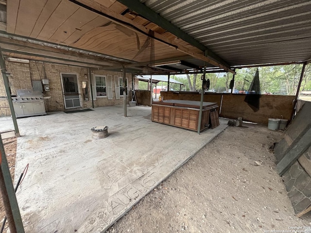 512 Brown Ln, Floresville, TX 78114 - view of patio featuring a hot tub
