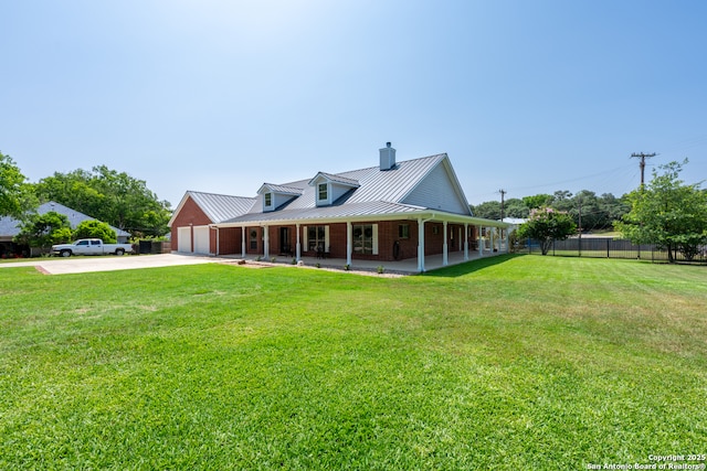 8718 Paseo Oaks, San Antonio, TX 78255 - view of front of property with a chimney, concrete driveway, a porch, metal roof, and an attached garage