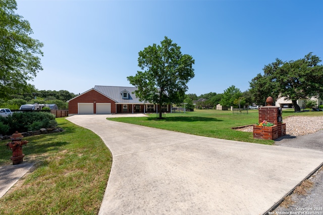 8718 Paseo Oaks, San Antonio, TX 78255 - view of front of home with driveway, an attached garage, and metal roof