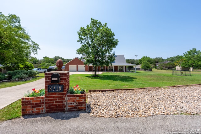 8718 Paseo Oaks, San Antonio, TX 78255 - view of front of property with a front lawn and concrete driveway