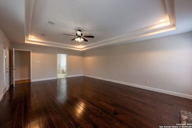 8718 Paseo Oaks, San Antonio, TX 78255 - unfurnished room featuring a raised ceiling, ceiling fan, dark wood-style floors, baseboards, and recessed lighting