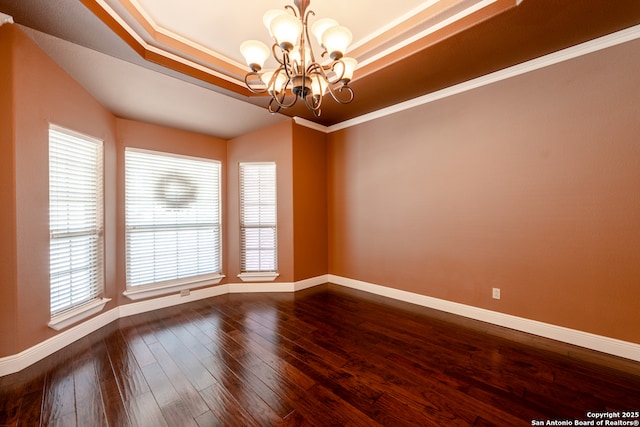 8718 Paseo Oaks, San Antonio, TX 78255 - unfurnished room with a chandelier, baseboards, dark wood-type flooring, a raised ceiling, and crown molding