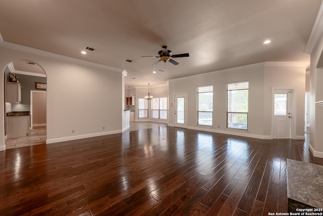 8718 Paseo Oaks, San Antonio, TX 78255 - unfurnished living room with ceiling fan, wood-type flooring, baseboards, arched walkways, and recessed lighting