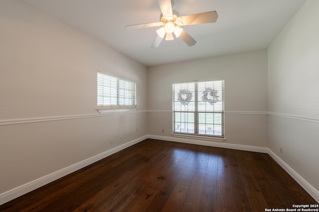 8718 Paseo Oaks, San Antonio, TX 78255 - spare room featuring baseboards, dark wood-style floors, and a ceiling fan