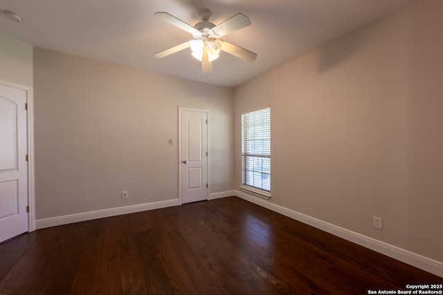 8718 Paseo Oaks, San Antonio, TX 78255 - spare room featuring baseboards, dark wood finished floors, ceiling fan, and a smoke detector