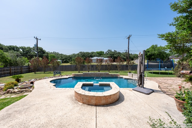 8718 Paseo Oaks, San Antonio, TX 78255 - view of pool with a trampoline, a patio area, and a pool with connected hot tub