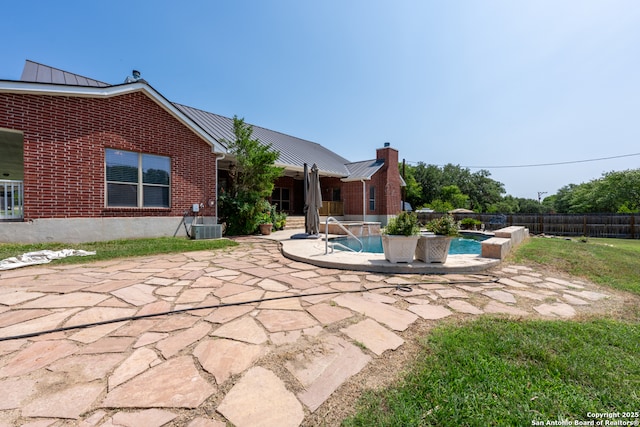 8718 Paseo Oaks, San Antonio, TX 78255 - view of pool featuring a patio, a fenced backyard, and central AC
