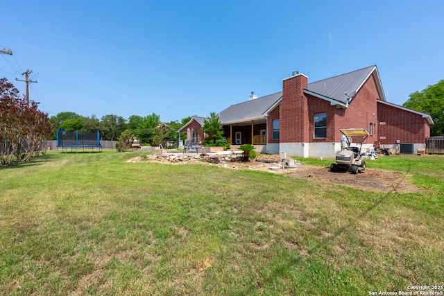 8718 Paseo Oaks, San Antonio, TX 78255 - view of yard featuring a trampoline