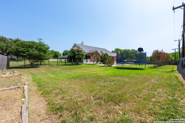 8718 Paseo Oaks, San Antonio, TX 78255 - view of yard featuring a trampoline
