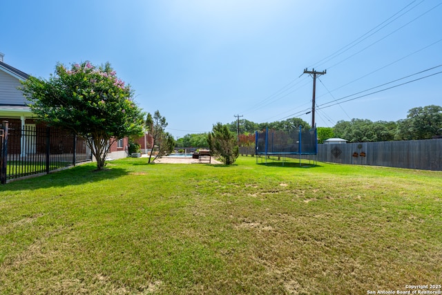 8718 Paseo Oaks, San Antonio, TX 78255 - view of yard with a trampoline