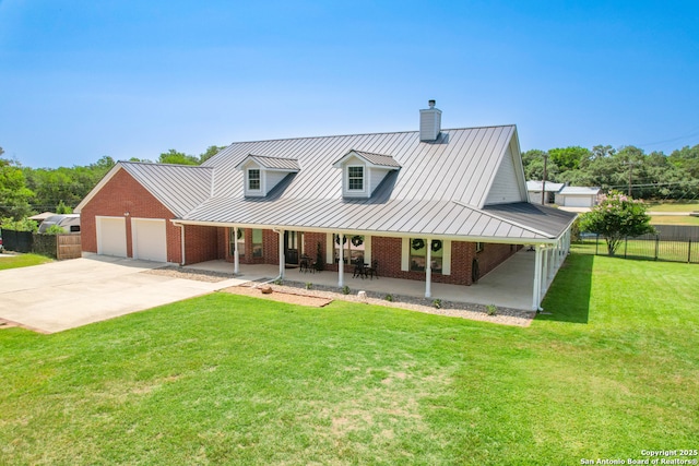 8718 Paseo Oaks, San Antonio, TX 78255 - view of front of property featuring brick siding, covered porch, a chimney, and a standing seam roof